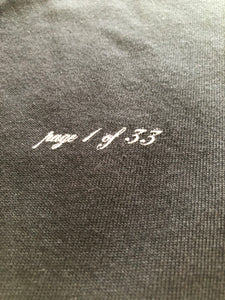 page 1 of 33 black tee